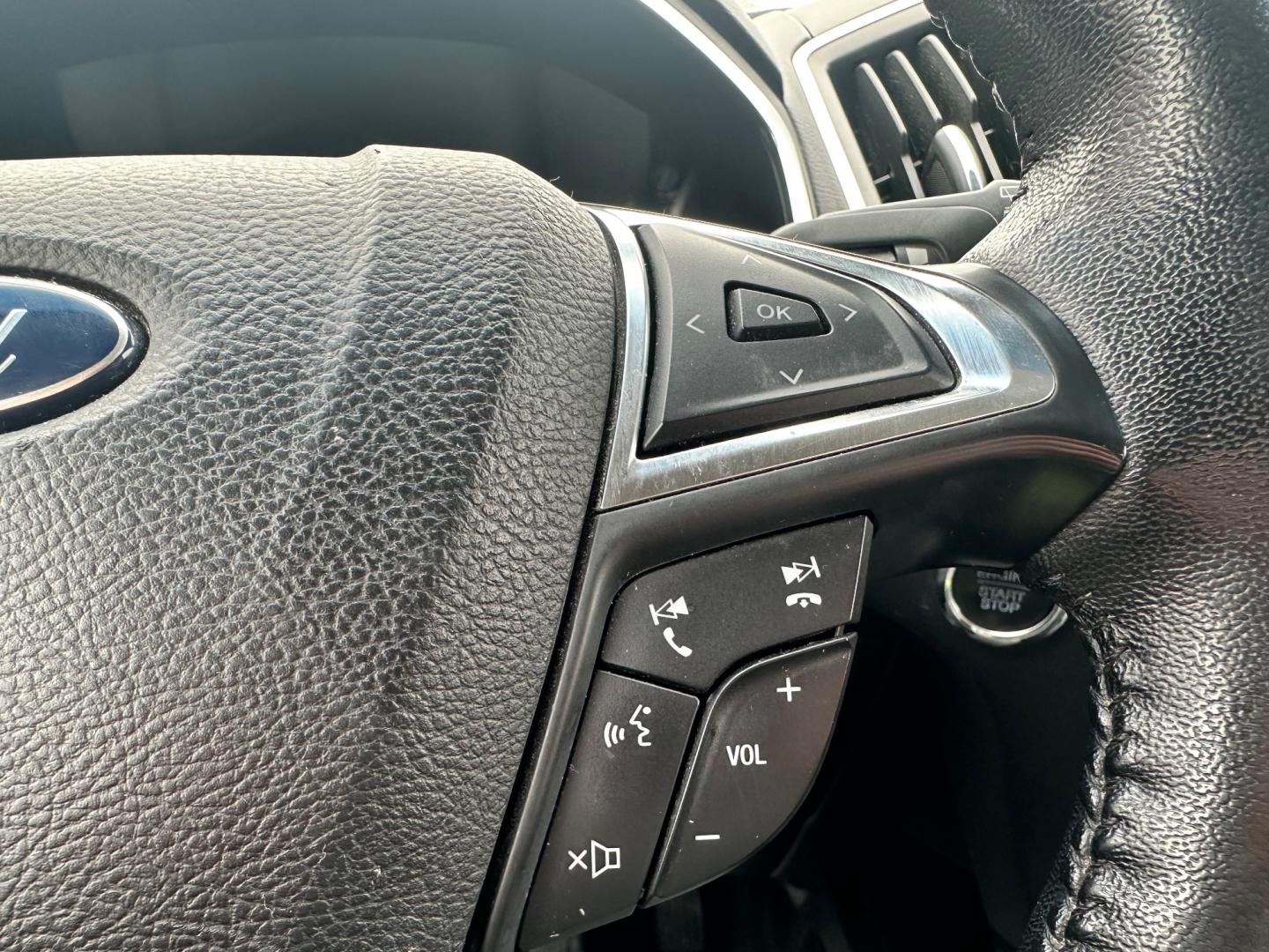 2017 Silver /Black Ford Edge Titanium (2FMPK4K92HB) with an 2.0L I4 DOHC 16V Turbo engine, 6-Speed Automatic transmission, located at 547 E. Main St., Orwell, OH, 44076, (440) 437-5893, 41.535435, -80.847855 - This 2017 Ford Edge Titanium AWD is a well-equipped midsize SUV. It comes with a powerful yet efficient 2.0L EcoBoost engine paired with a smooth 6-speed automatic transmission. Notable features include LED daytime running lights, dusk-sensing headlights, leather interior, auto-dimming rearview mirr - Photo#21
